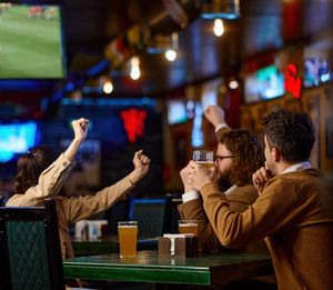 Friends drink in a bar