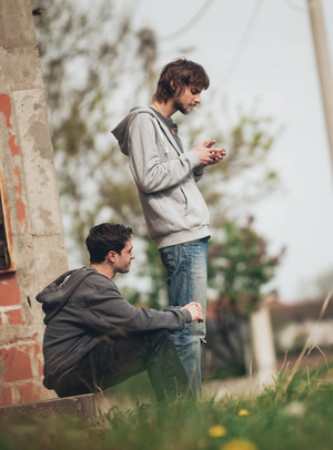 Two friends smokes marijuana