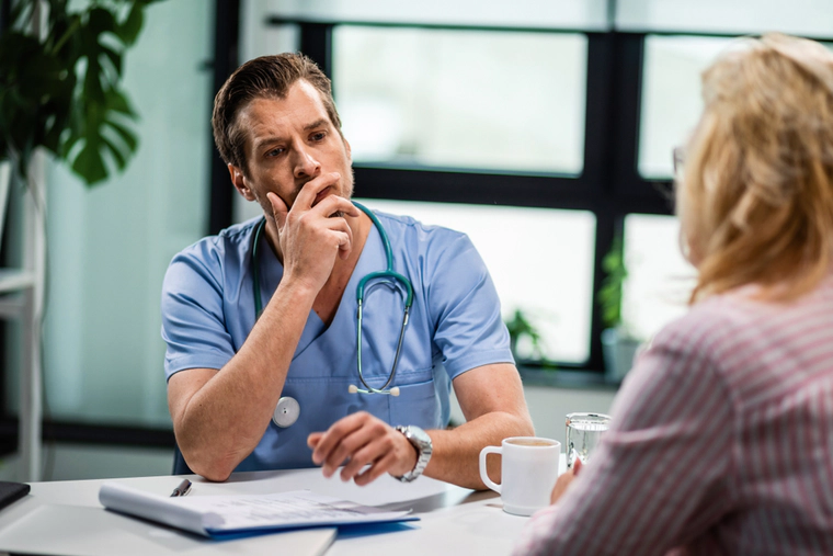 Doctor is talking to a patient