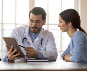 Doctor talks with a patient