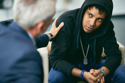 Boy receiving counseling