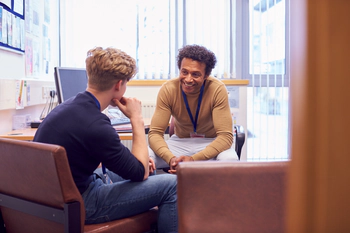 Teacher talks with a student about drug addiction