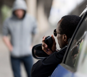 Policecar approaching potential suspect