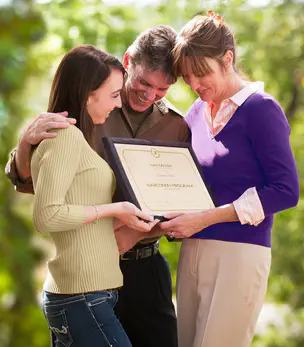 Graduate with her family